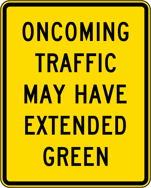 Oncoming Traffic May Have Extended Green Sign